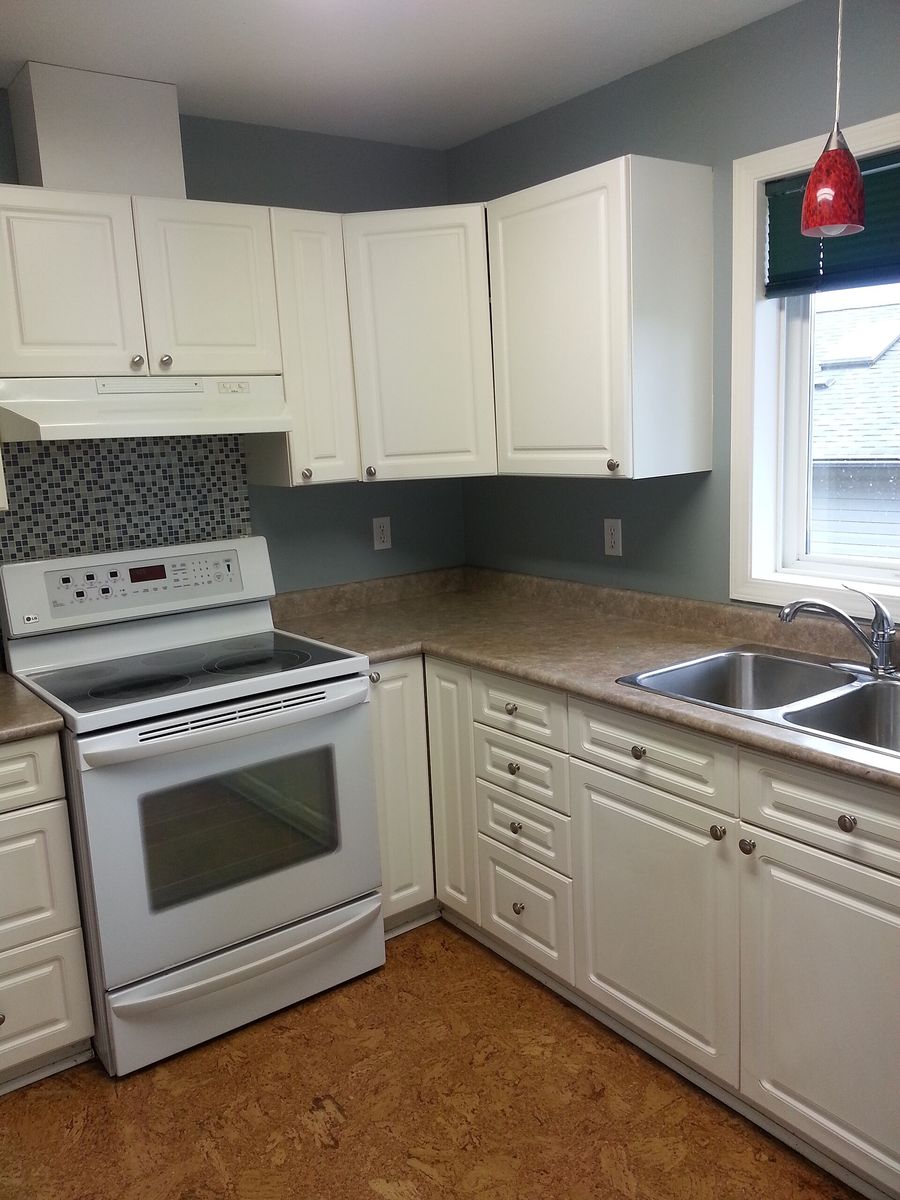 After: galley kitchen rebuilt from the studs, Garden Grove